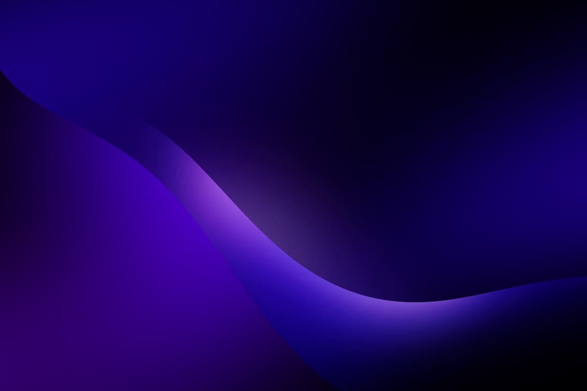 A deep indigo gradient forming a soft curved ridge